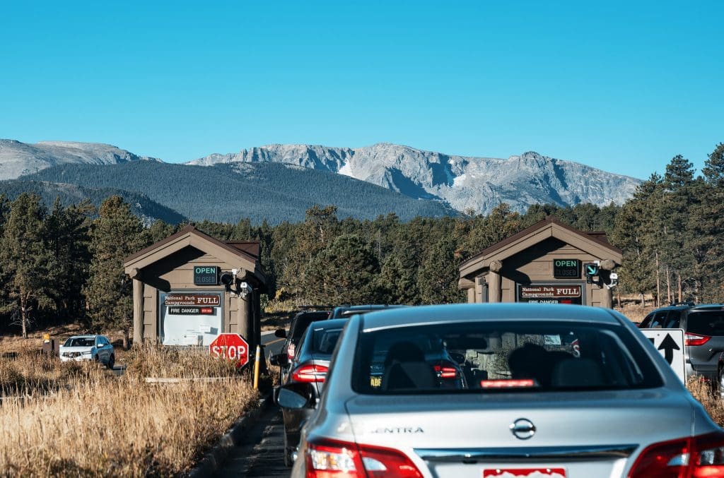 Be Prepared! Ticketed Entry Reservations, Know Which Park's Will Have Them in 2022 11 Rocky Mountain National Park Entrance Station Traffic where in 2022 Timed Permit Entry Reservations will be required.